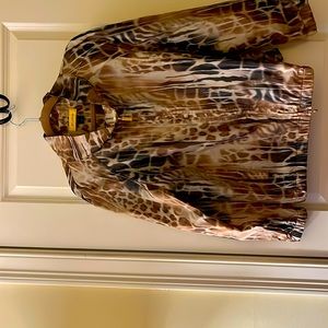 Short bomber style jacket. Designer